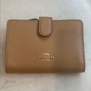 Coach medium corner zip wallet.  New with tags.